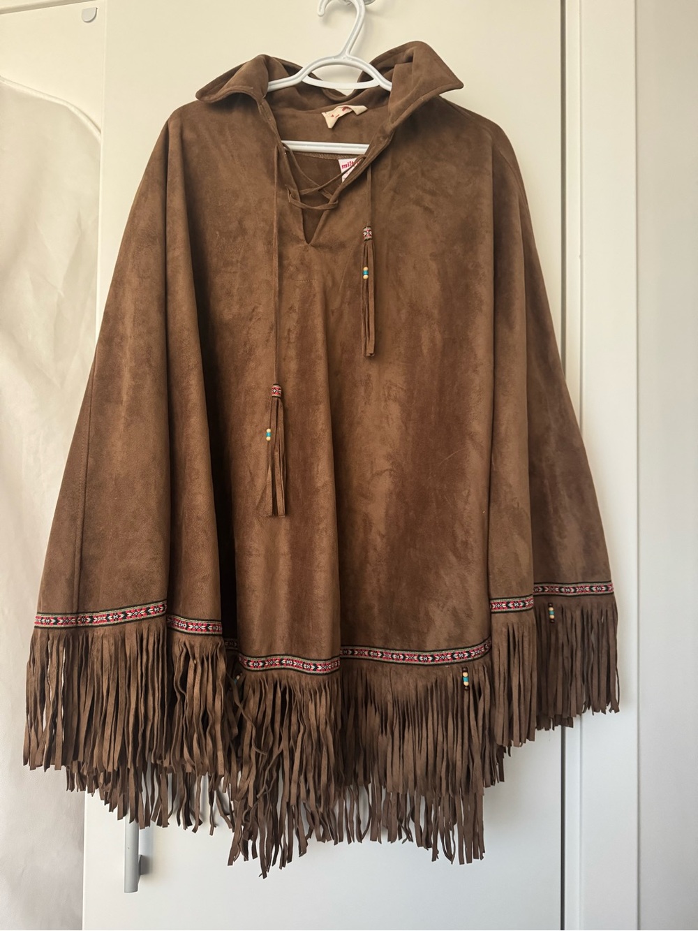 Fringed Faux-Suede Cape in Brown with Tassel Detail